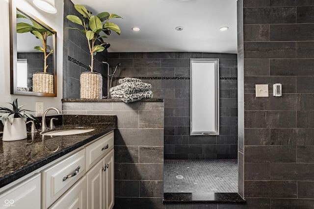 5809 N Washington Blvd, Indianapolis, IN 46220 - bathroom featuring vanity, a walk in shower, and recessed lighting
