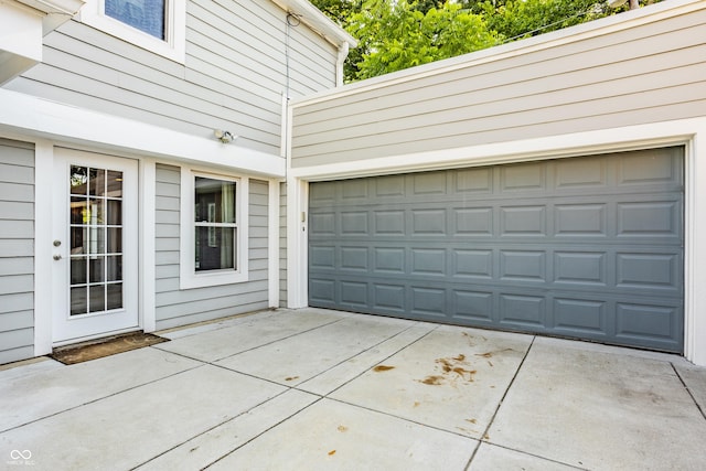 5809 N Washington Blvd, Indianapolis, IN 46220 - garage featuring concrete driveway