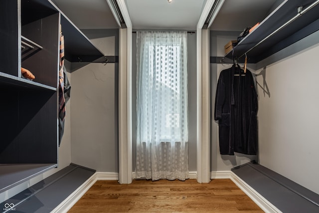 5809 N Washington Blvd, Indianapolis, IN 46220 - walk in closet featuring wood finished floors