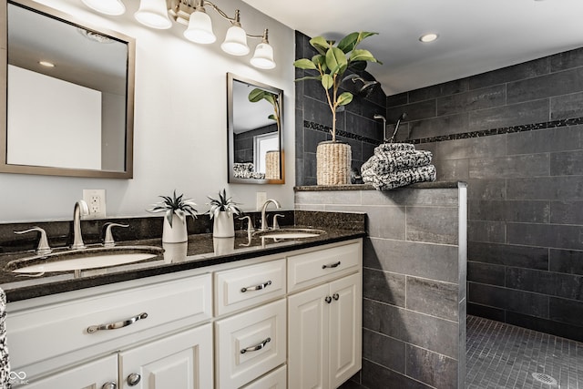 5809 N Washington Blvd, Indianapolis, IN 46220 - bathroom featuring double vanity, a walk in shower, and recessed lighting