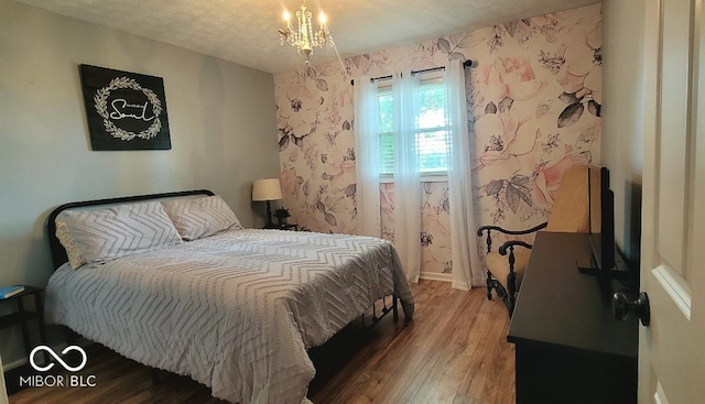 6974 S County Road 400 E, Clayton, IN 46118 - bedroom with wood finished floors and wallpapered walls