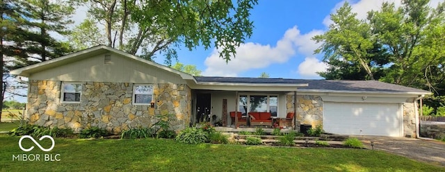 6974 S County Road 400 E, Clayton, IN 46118 - single story home featuring stone siding, a garage, covered porch, driveway, and a front yard