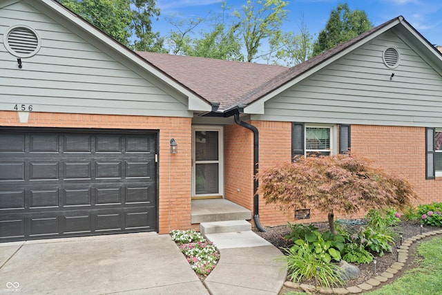 456 Old Hickory Ln, Greenwood, IN 46142 - ranch-style home with brick siding, an attached garage, driveway, and a shingled roof