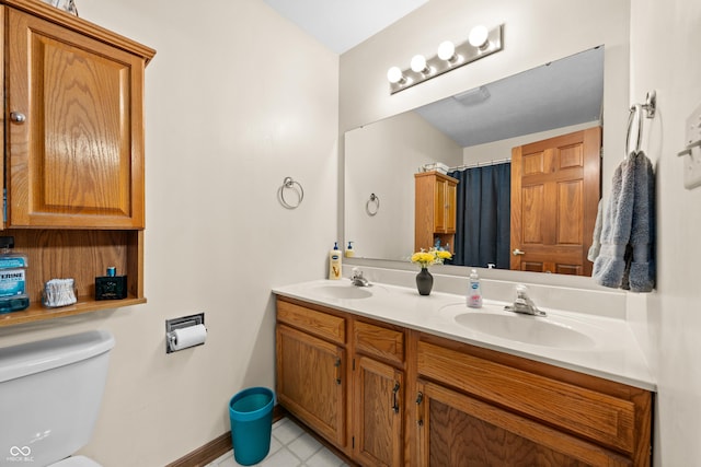 456 Old Hickory Ln, Greenwood, IN 46142 - bathroom featuring double vanity and toilet