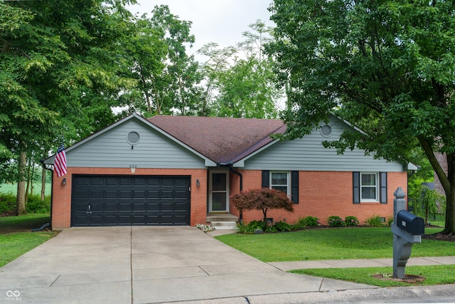 456 Old Hickory Ln, Greenwood, IN 46142 - ranch-style home featuring concrete driveway, an attached garage, a front yard, and brick siding