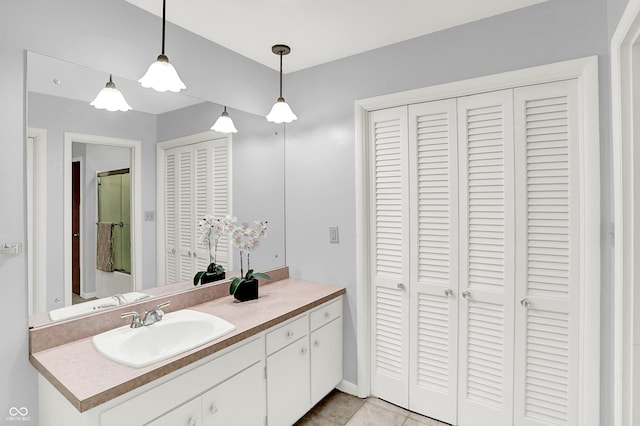 1441 Hunter Pl, Columbus, IN 47203 - full bathroom with a closet, vanity, and tile patterned floors