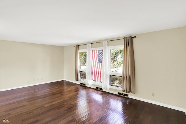 1441 Hunter Pl, Columbus, IN 47203 - unfurnished room featuring dark wood finished floors and baseboards