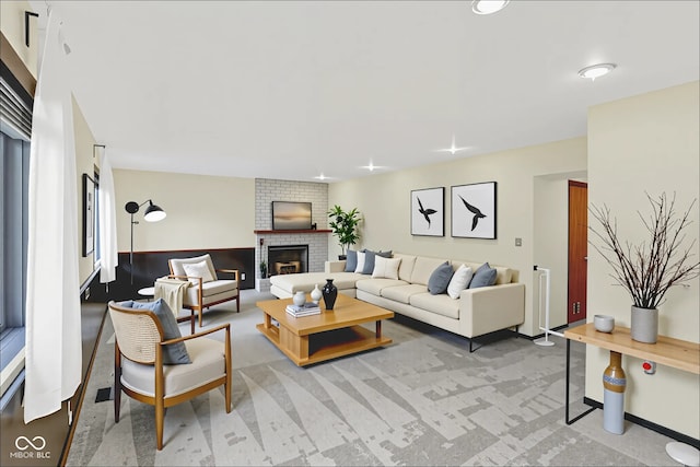 1441 Hunter Pl, Columbus, IN 47203 - living area featuring a brick fireplace and light colored carpet