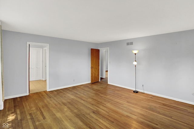 1441 Hunter Pl, Columbus, IN 47203 - spare room featuring hardwood / wood-style floors and baseboards