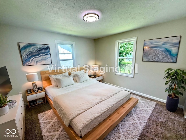 1809 Beam Rd, Columbus, IN 47201 - bedroom with carpet flooring and a textured ceiling