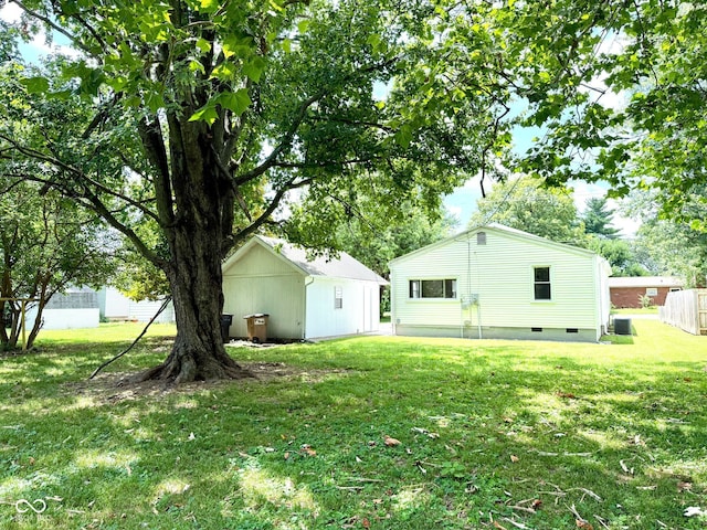 1809 Beam Rd, Columbus, IN 47201 - back of property with crawl space and a yard