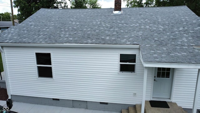 1809 Beam Rd, Columbus, IN 47201 - exterior space with a chimney, a shingled roof, and crawl space