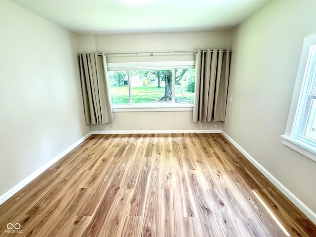 1809 Beam Rd, Columbus, IN 47201 - spare room featuring wood finished floors