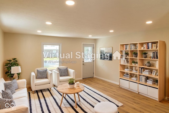 1809 Beam Rd, Columbus, IN 47201 - living room with light wood-style flooring and recessed lighting