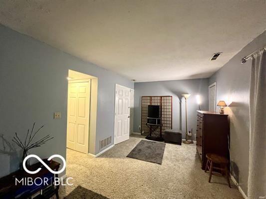 9406 S Lake Ridge Dr, Bloomington, IN 47401 - bedroom featuring carpet floors