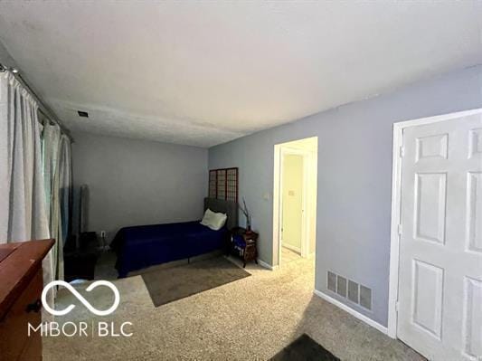 9406 S Lake Ridge Dr, Bloomington, IN 47401 - carpeted bedroom with baseboards