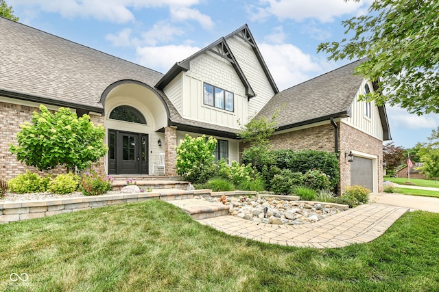 6413 Amber Pass, Plainfield, IN 46168 - craftsman-style house featuring brick siding, board and batten siding, roof with shingles, a front yard, and driveway