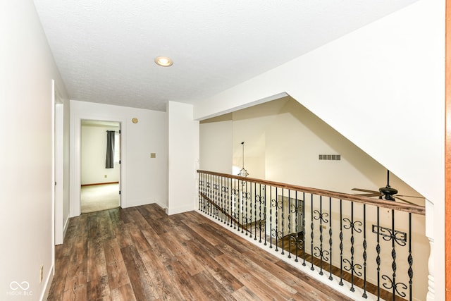 6413 Amber Pass, Plainfield, IN 46168 - hall featuring hardwood / wood-style floors, a textured ceiling, and recessed lighting