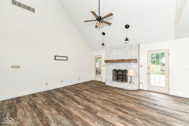 6413 Amber Pass, Plainfield, IN 46168 - unfurnished living room with high vaulted ceiling, ceiling fan, wood finished floors, and a brick fireplace