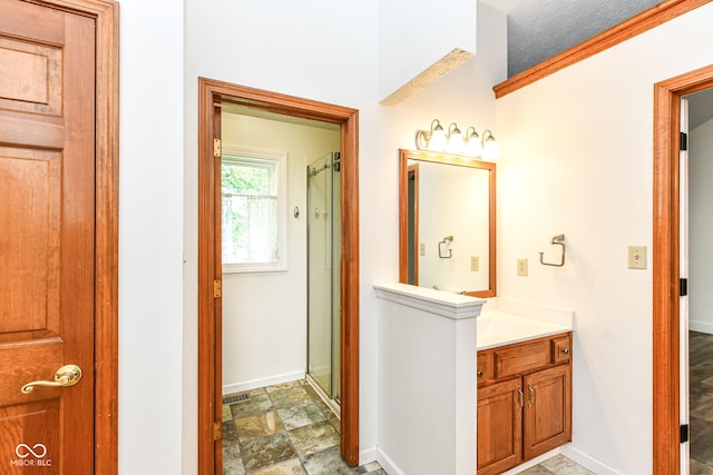 6413 Amber Pass, Plainfield, IN 46168 - bathroom with vanity, stone finish floors, and a stall shower