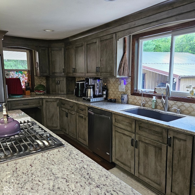 681 Hancock School Rd, Spencer, IN 47460 - kitchen with dishwasher, plenty of natural light, backsplash, and gas stovetop