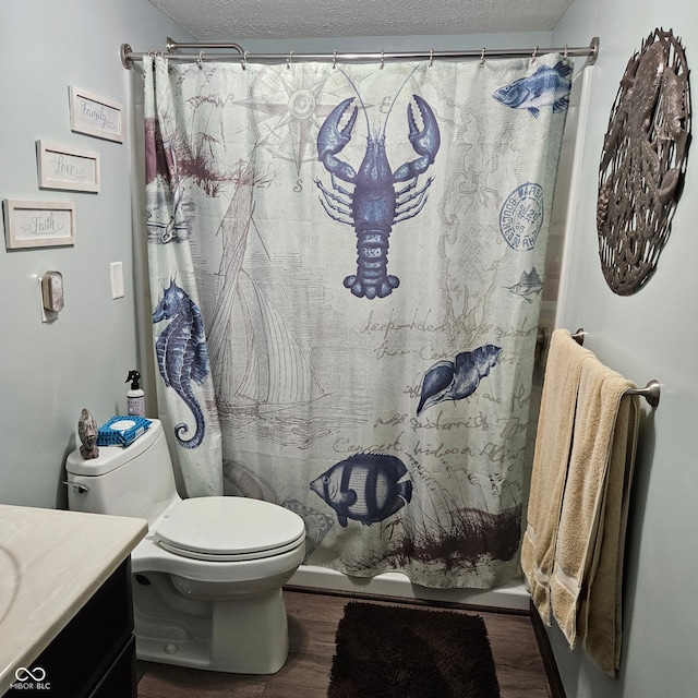 681 Hancock School Rd, Spencer, IN 47460 - bathroom with wood finished floors, vanity, a textured ceiling, and a shower with shower curtain