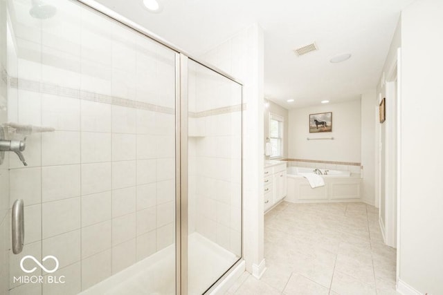 7929 W Bristol Way, New Palestine, IN 46163 - bathroom featuring a garden tub, a stall shower, tile patterned floors, and recessed lighting