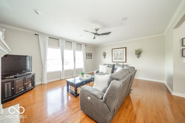 7929 W Bristol Way, New Palestine, IN 46163 - living area with light wood-style floors, ceiling fan, and ornamental molding