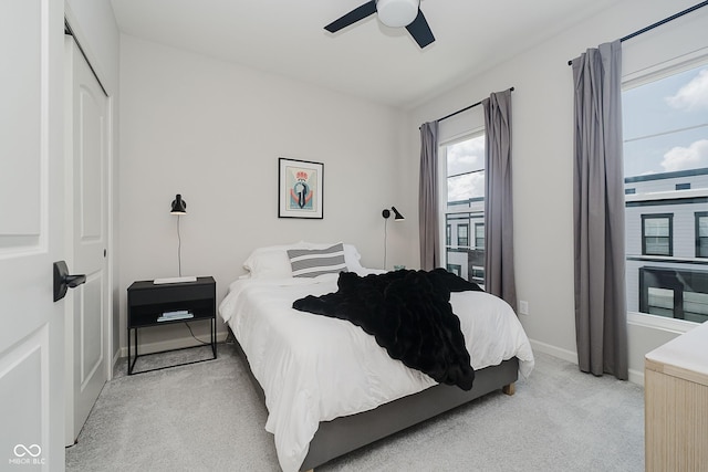 9732 Junction, Fishers, IN 46037 - bedroom featuring light carpet, a closet, and a ceiling fan