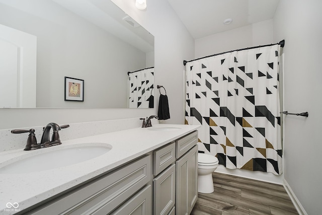 9732 Junction, Fishers, IN 46037 - bathroom with double vanity and wood finished floors