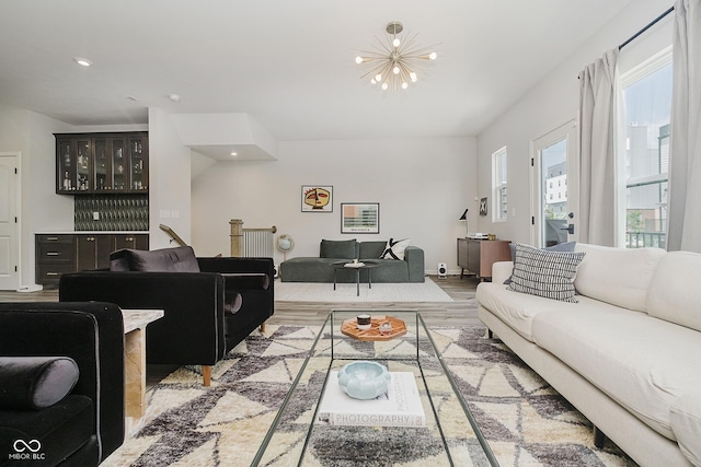 9732 Junction, Fishers, IN 46037 - living area featuring a chandelier, light wood finished floors, and recessed lighting