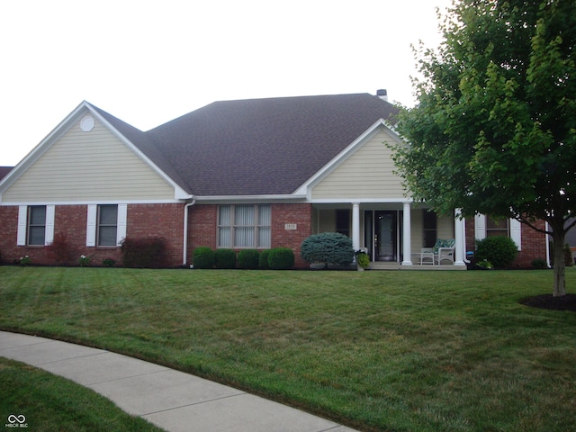 7839 Jessica Ct, Avon, IN 46123 - view of front of property featuring a porch, brick siding, and a front yard