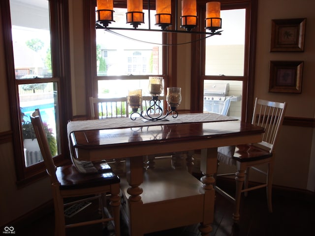 7839 Jessica Ct, Avon, IN 46123 - dining room featuring a chandelier and baseboards
