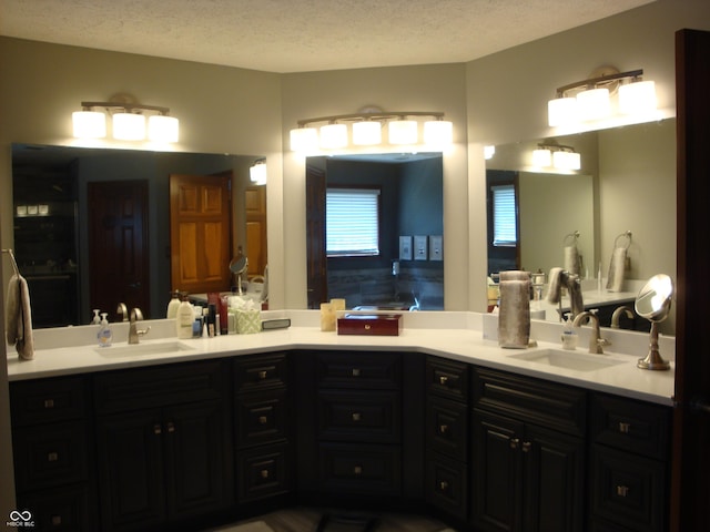 7839 Jessica Ct, Avon, IN 46123 - full bath featuring double vanity and a textured ceiling
