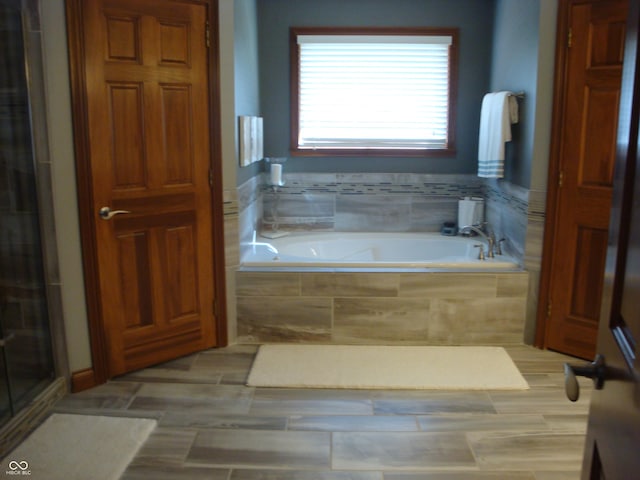 7839 Jessica Ct, Avon, IN 46123 - full bath featuring a garden tub and an enclosed shower