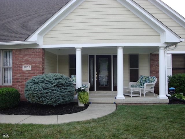 7839 Jessica Ct, Avon, IN 46123 - property entrance with a porch, brick siding, and roof with shingles