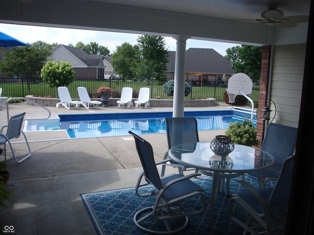 7839 Jessica Ct, Avon, IN 46123 - view of swimming pool with a patio, a ceiling fan, and outdoor dining area