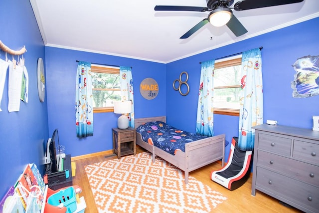 8310 N County Road 700 W, Scipio, IN 47273 - bedroom featuring wood finished floors, ornamental molding, and ceiling fan