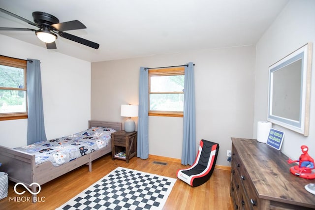 8310 N County Road 700 W, Scipio, IN 47273 - bedroom featuring light wood-style floors and ceiling fan