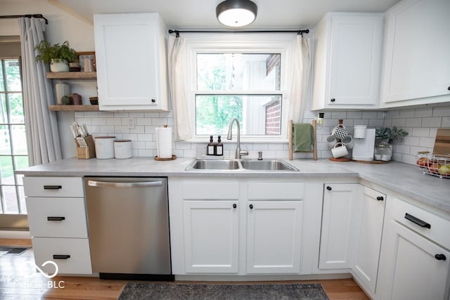 8310 N County Road 700 W, Scipio, IN 47273 - kitchen with stainless steel dishwasher, open shelves, light countertops, and white cabinets