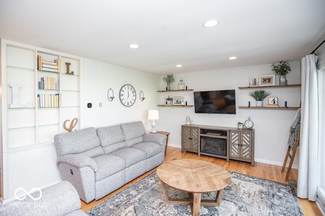 8310 N County Road 700 W, Scipio, IN 47273 - living room featuring wood finished floors and recessed lighting