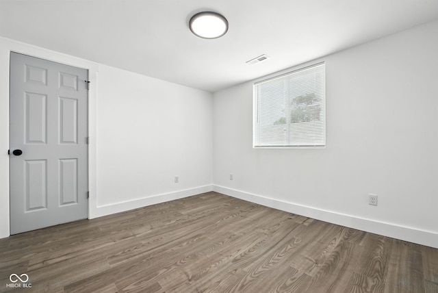 2000 N Dexter St, Indianapolis, IN 46202 - unfurnished room with wood finished floors and baseboards