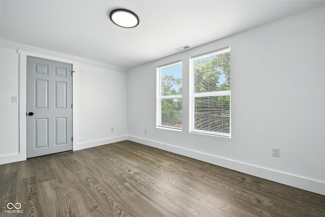 2000 N Dexter St, Indianapolis, IN 46202 - unfurnished room featuring dark wood finished floors and baseboards