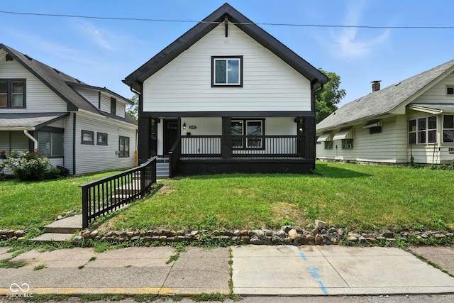 2000 N Dexter St, Indianapolis, IN 46202 - view of front of property featuring covered porch and a front yard