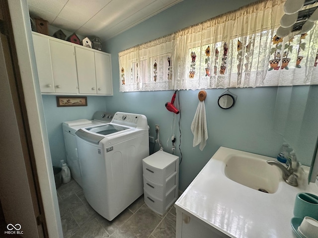 9012 W Evergreen Dr, Columbus, IN 47201 - washroom with independent washer and dryer, tile patterned flooring, and cabinet space