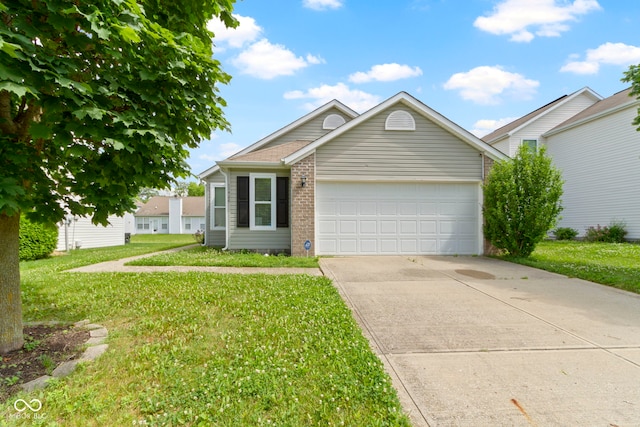 11426 High Grass Dr, Indianapolis, IN 46235 - ranch-style house with driveway, a front lawn, a garage, and brick siding