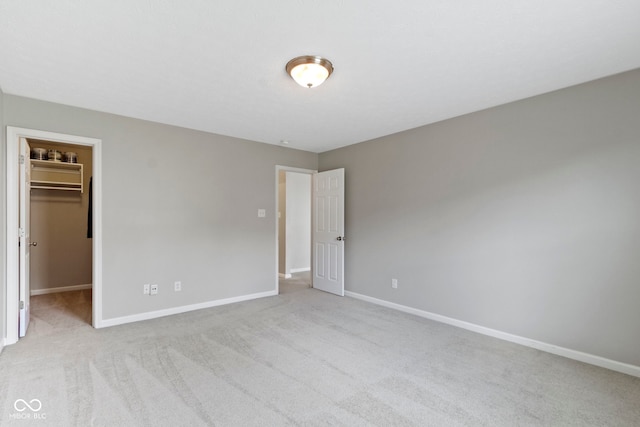 11426 High Grass Dr, Indianapolis, IN 46235 - unfurnished bedroom featuring carpet and a spacious closet