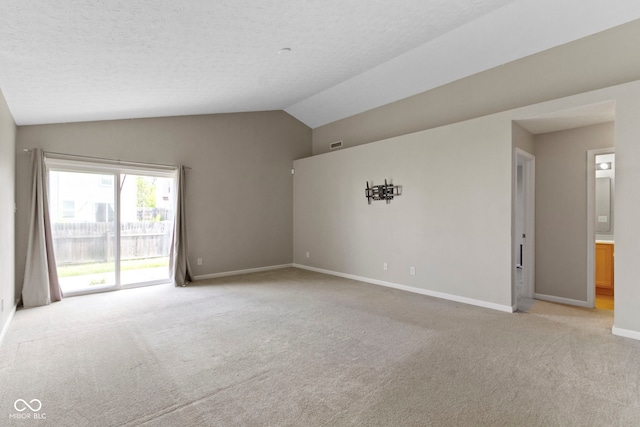 11426 High Grass Dr, Indianapolis, IN 46235 - unfurnished room featuring lofted ceiling and light colored carpet