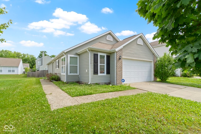 11426 High Grass Dr, Indianapolis, IN 46235 - view of front of property featuring an attached garage, concrete driveway, and brick siding