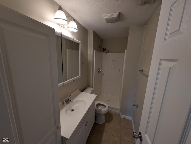 8454 Saxon Ct, Columbus, IN 47201 - full bathroom with a shower stall, vanity, a textured ceiling, and tile patterned flooring